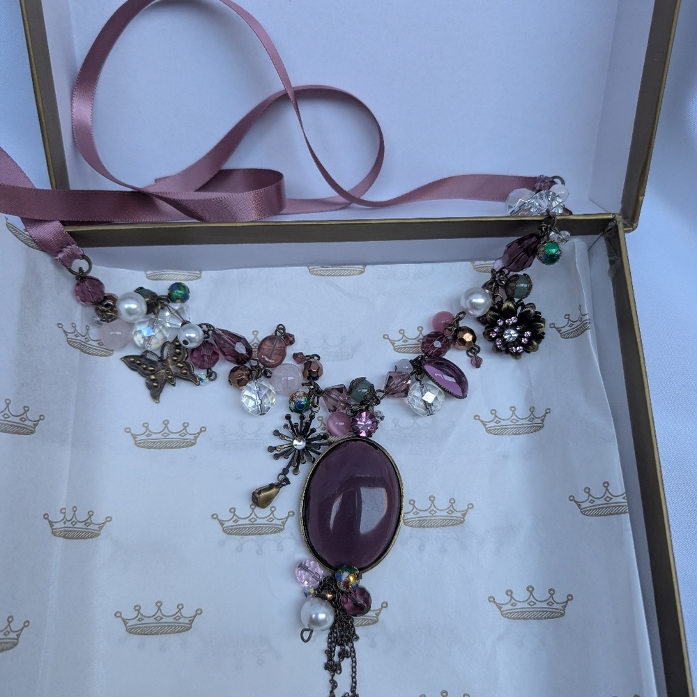 Elegant purple and Gold Necklace by William Ashley fine china. Never worn.